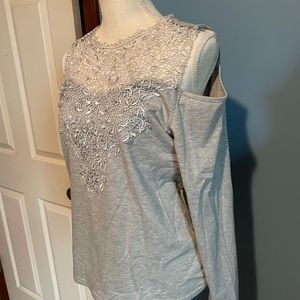 Lace trim off the shoulder